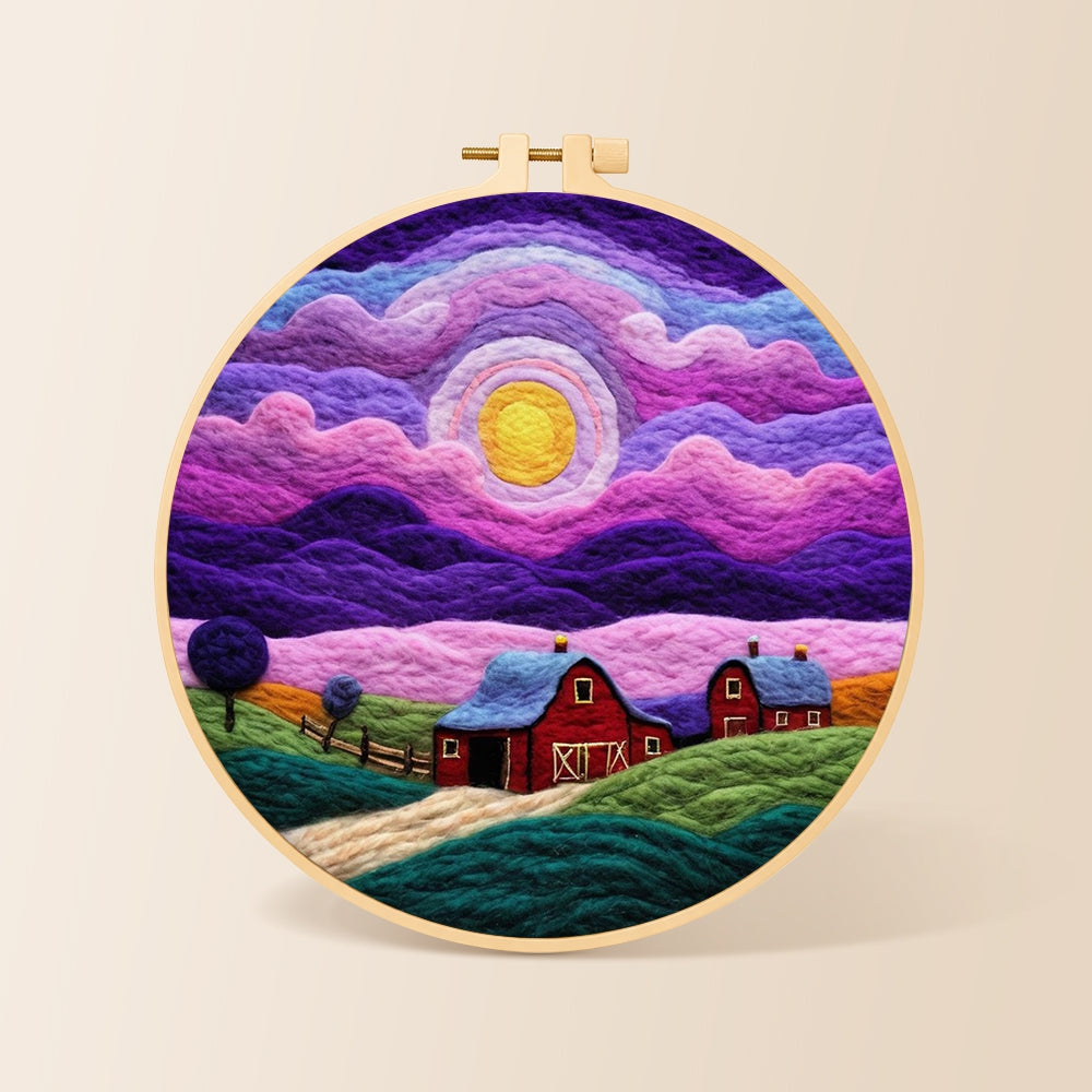 Dreamy swirling purple sky and red barn needle felting kit for beginners with a round wooden frame