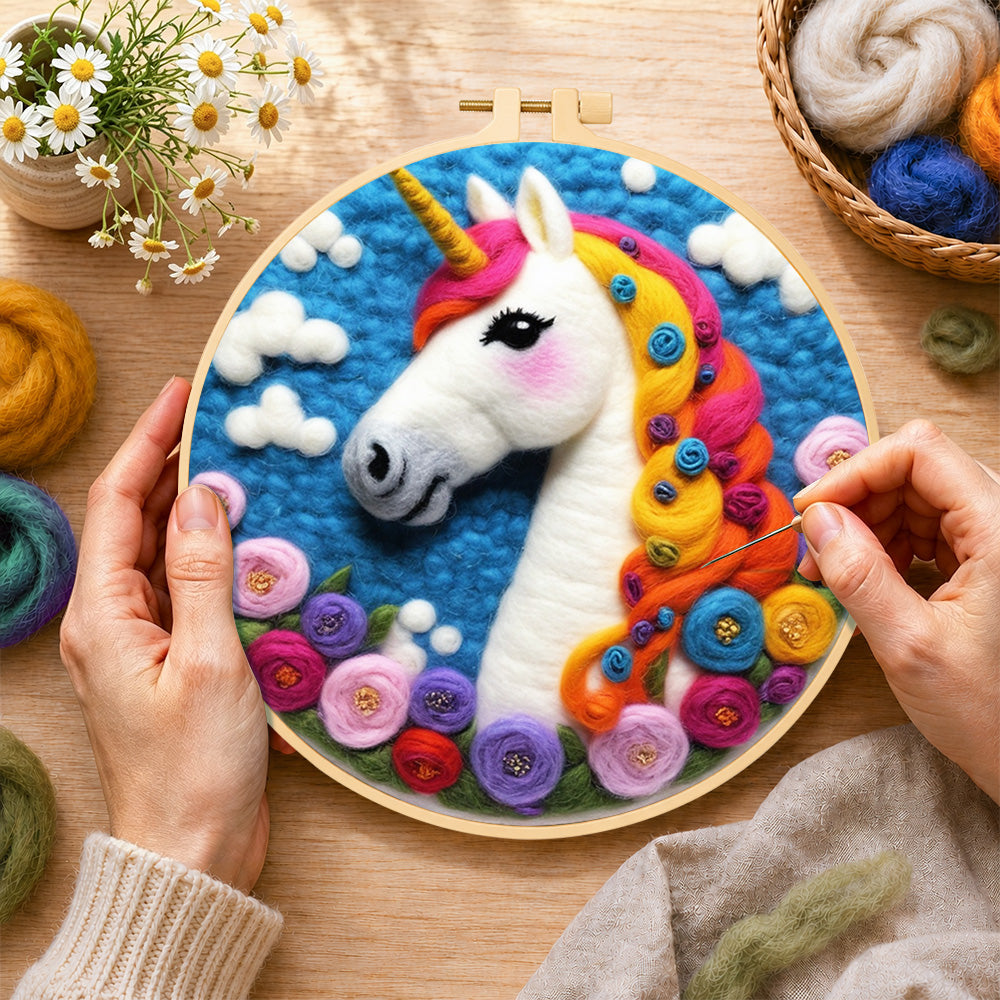 Creating the dreamy unicorn and flowers wool painting by hand with a felting needle