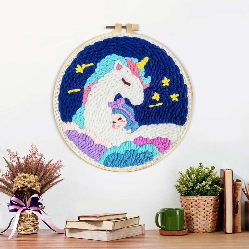 Finished dreamy unicorn on clouds artwork displayed on a wall