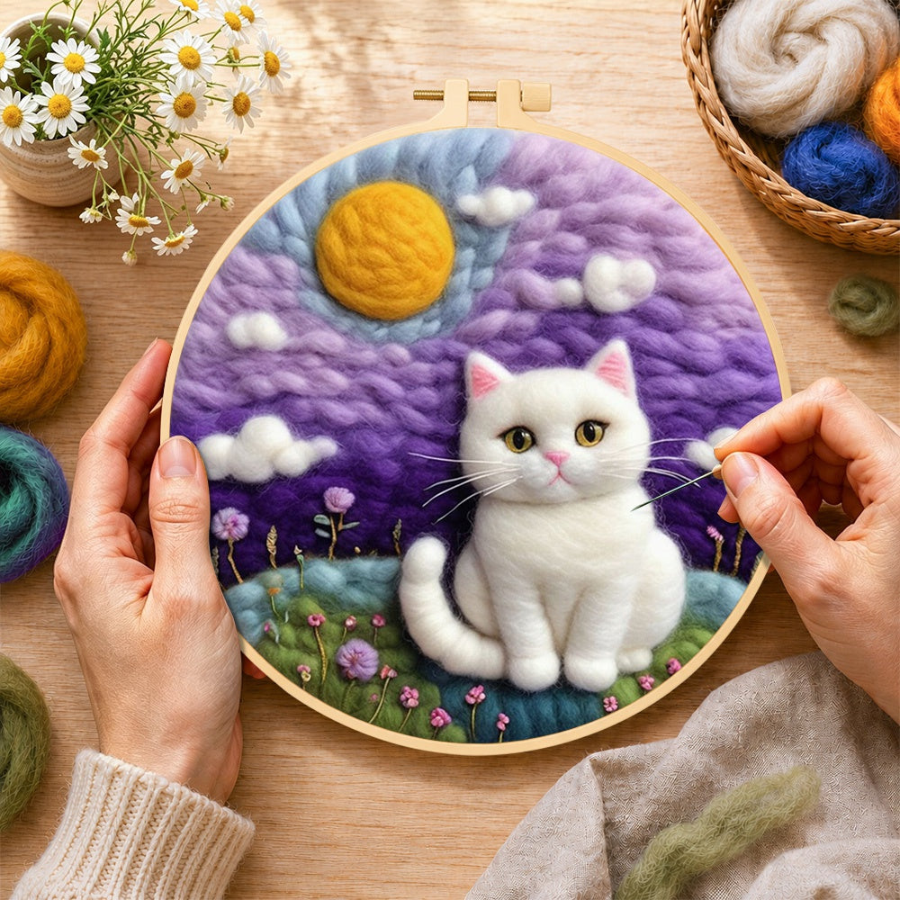 Creating the dreamy white cat in purple clouds wool painting by hand with a felting needle