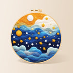 Drifting blue clouds and yellow stars needle felting kit for beginners with a round wooden frame