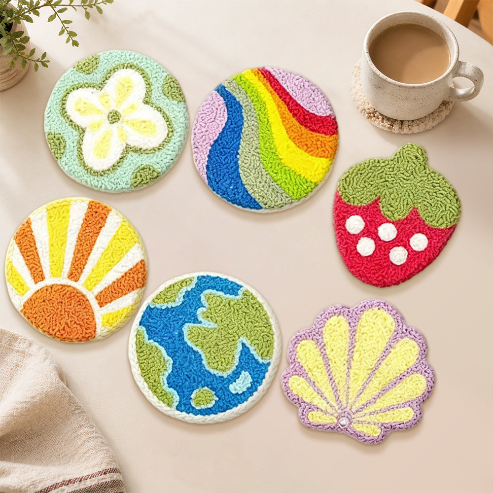 Earth, rainbow and strawberry punch needle coasters used for home decoration