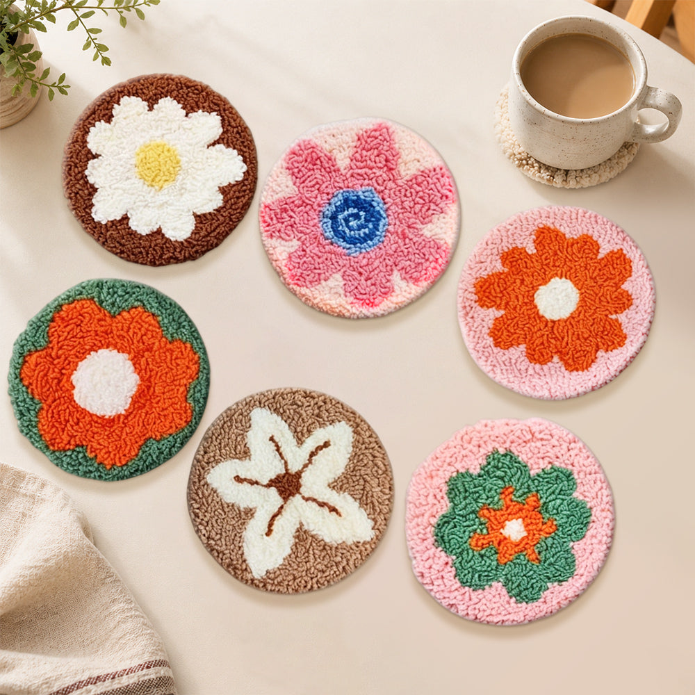 Earth-toned flowers punch needle coasters used for home decoration