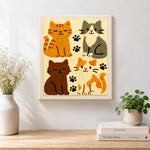 Finished elegant four cats and paw prints artwork displayed on a wall