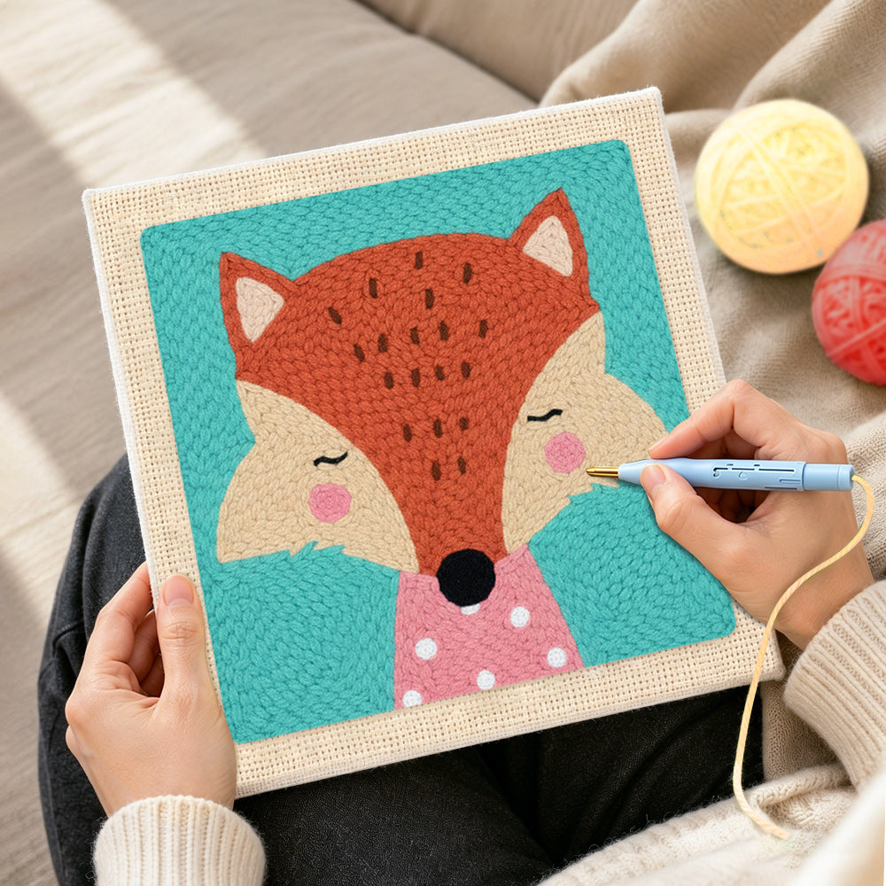 Creating handmade elegant fox with pink polka dot collar punch needle artwork