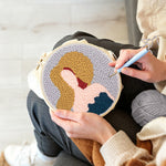 Creating handmade elegant lady with fashion hat punch needle artwork