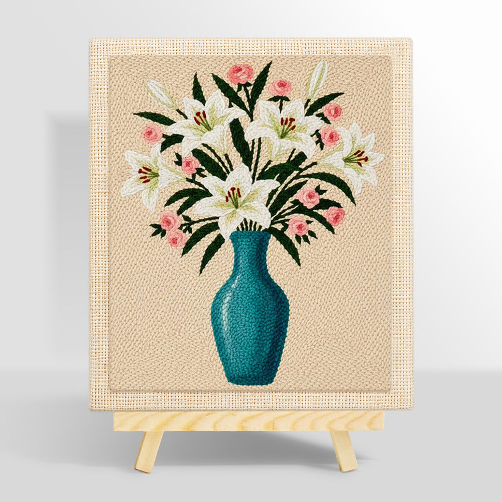Elegant lily and pink roses in blue vase punch needle kit for beginners