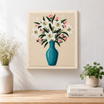 Finished elegant lily and pink roses in blue vase artwork displayed on a wall