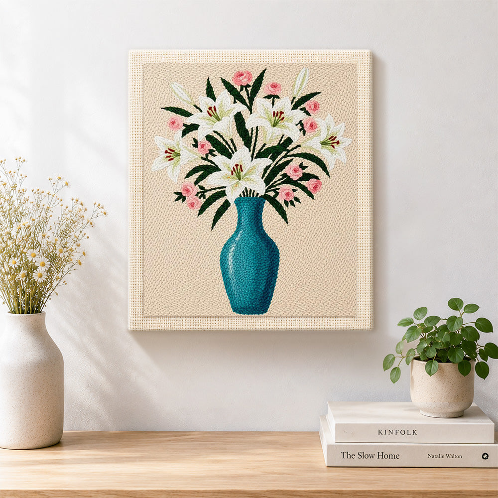 Finished elegant lily and pink roses in blue vase artwork displayed on a wall