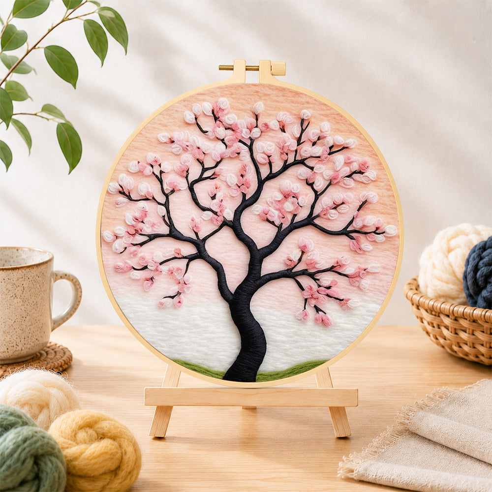 Finished elegant pink cherry blossom tree needle felting displayed on a wooden easel