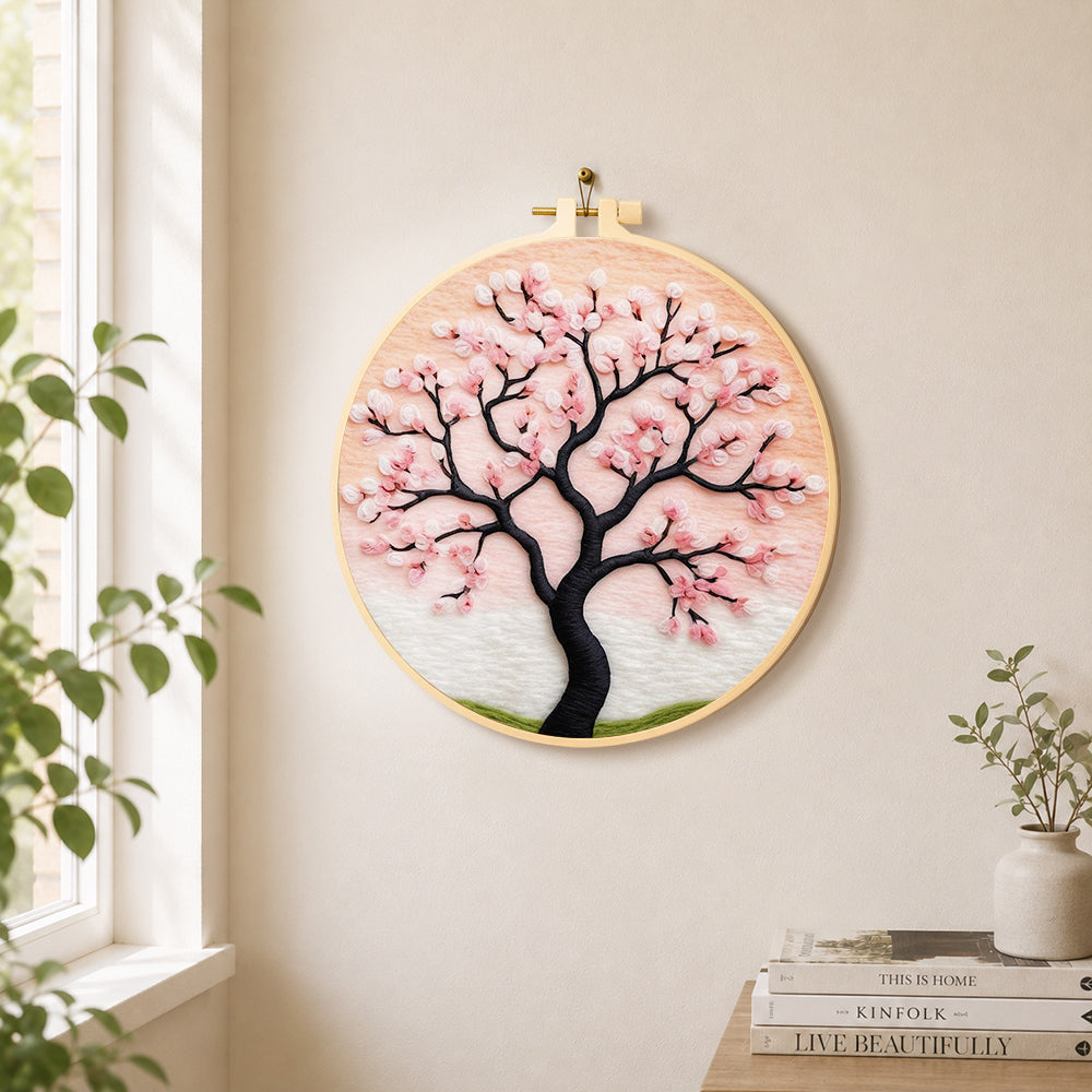Elegant pink cherry blossom tree needle felt wall art displayed in a bright home interior