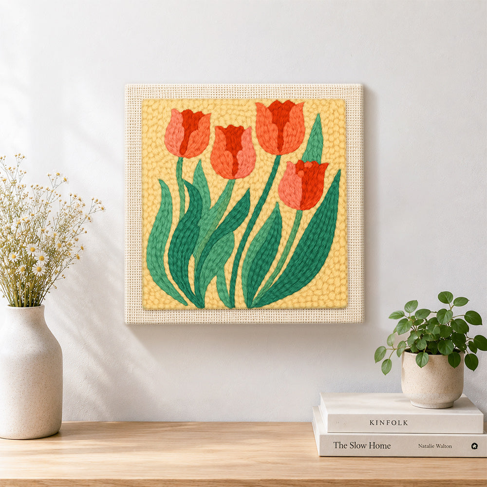 Finished elegant red tulips artwork displayed on a wall