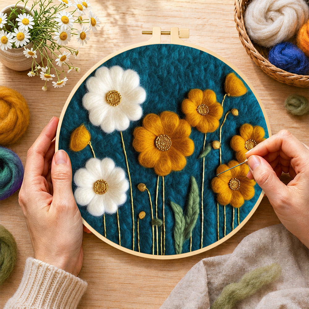 Creating the elegant white and yellow daisies wool painting by hand with a felting needle