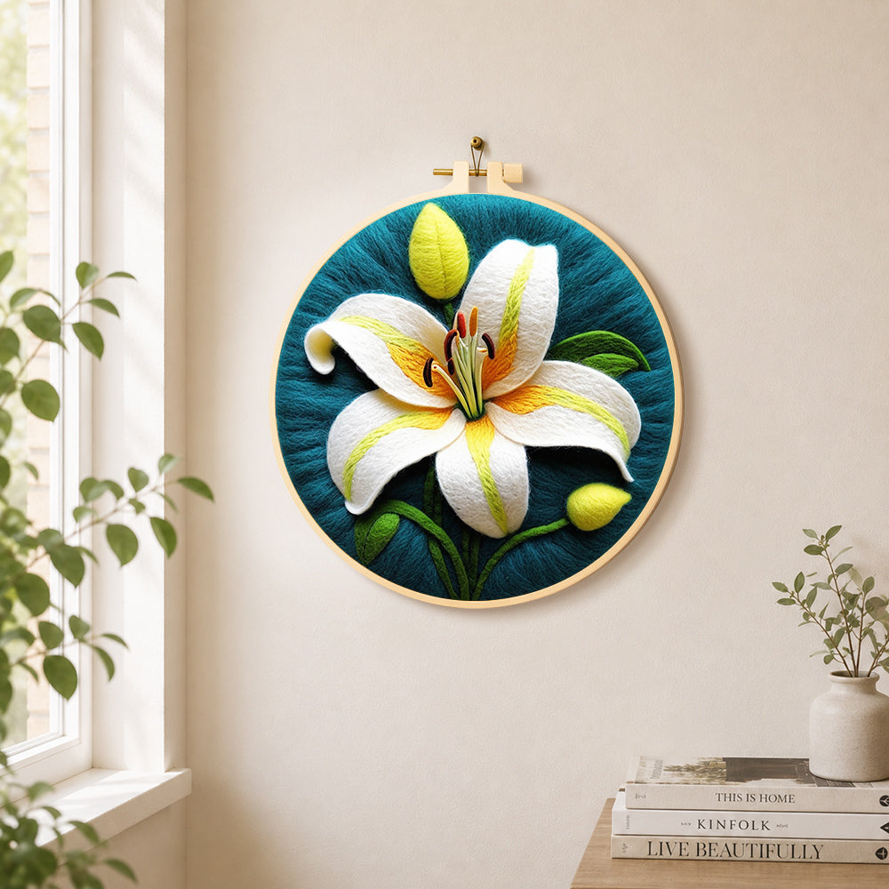 Elegant white lily needle felt wall art displayed in a bright home interior