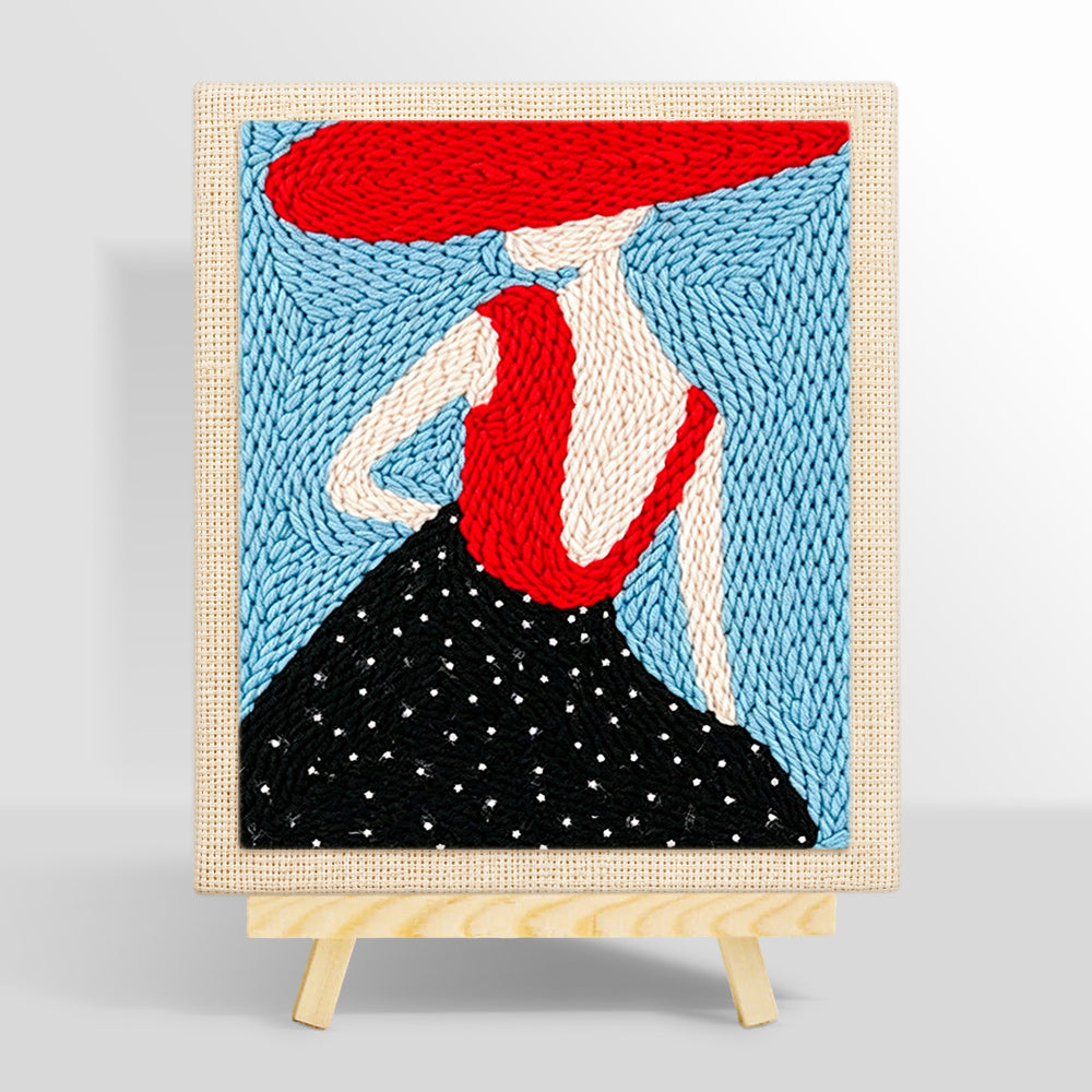 Elegant woman in red hat punch needle kit for beginners