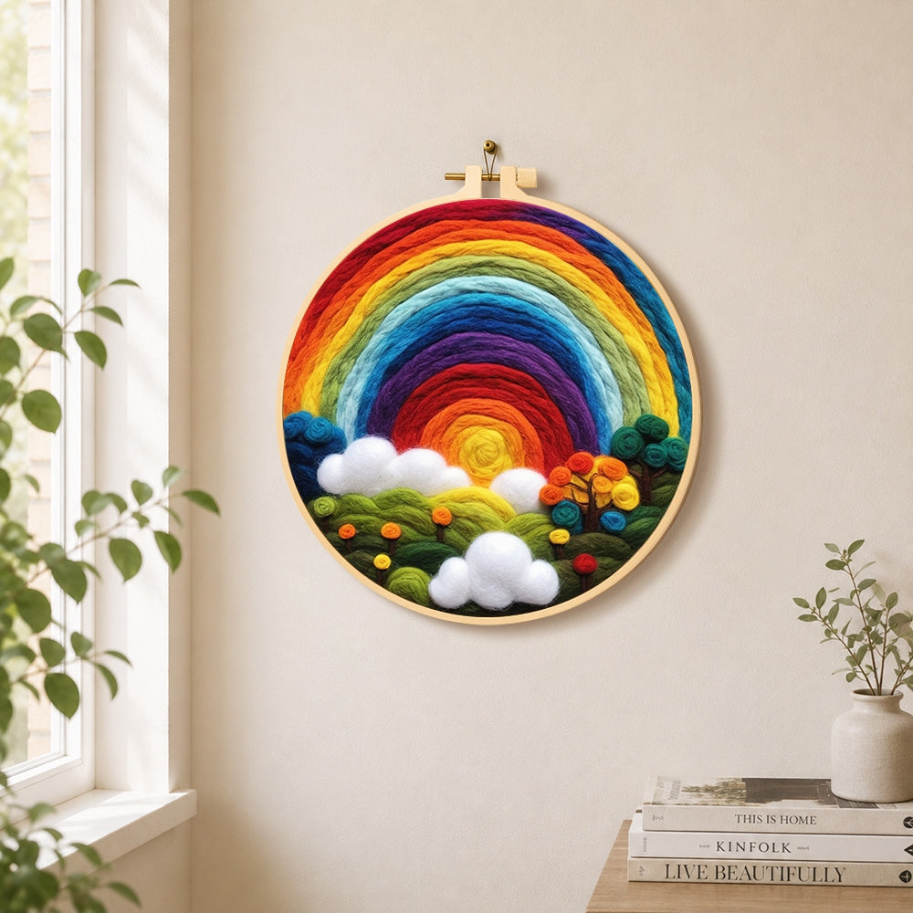 Enchanted forest rainbow needle felt wall art displayed in a bright home interior
