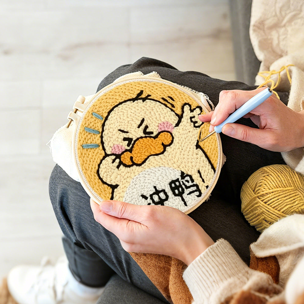 Creating handmade encouraging cartoon duck punch needle artwork