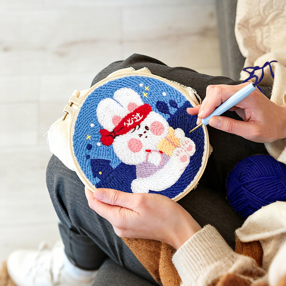 Creating handmade encouraging cartoon rabbit punch needle artwork