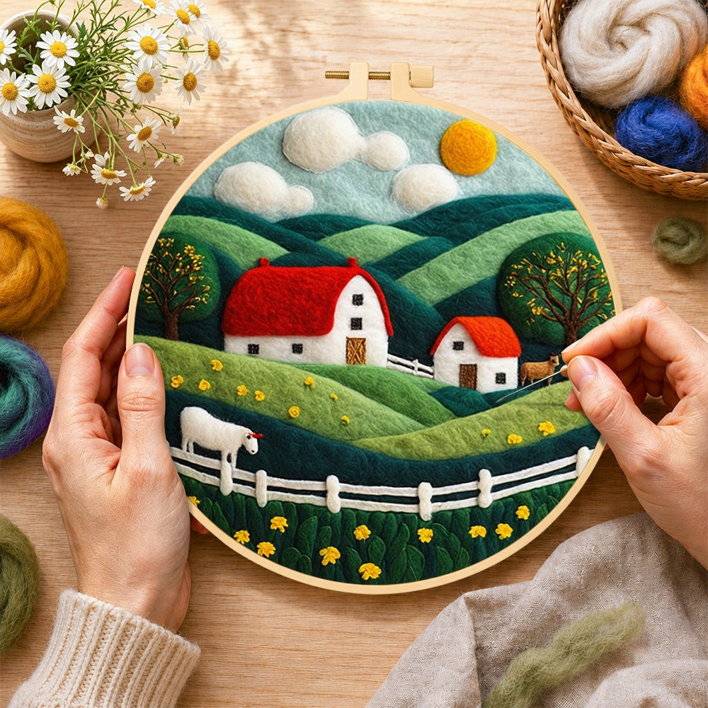 Creating the english cottage and rolling hills wool painting by hand with a felting needle