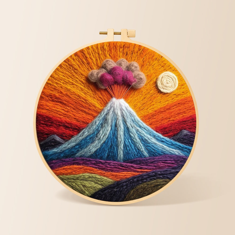 Erupting volcano with smoke clouds needle felting kit for beginners with a round wooden frame