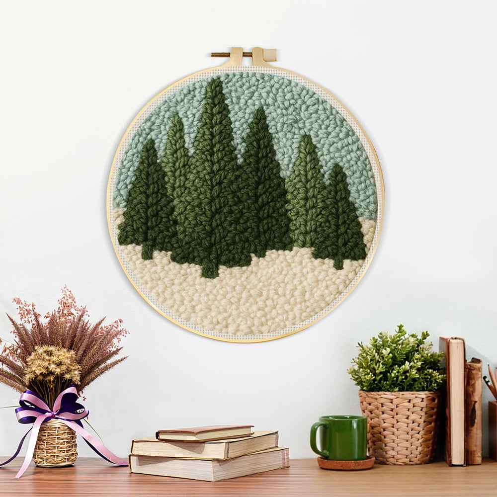 Finished evergreen forest artwork displayed on a wall