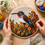 Creating the exquisite hummingbird with autumn flowers wool painting by hand with a felting needle
