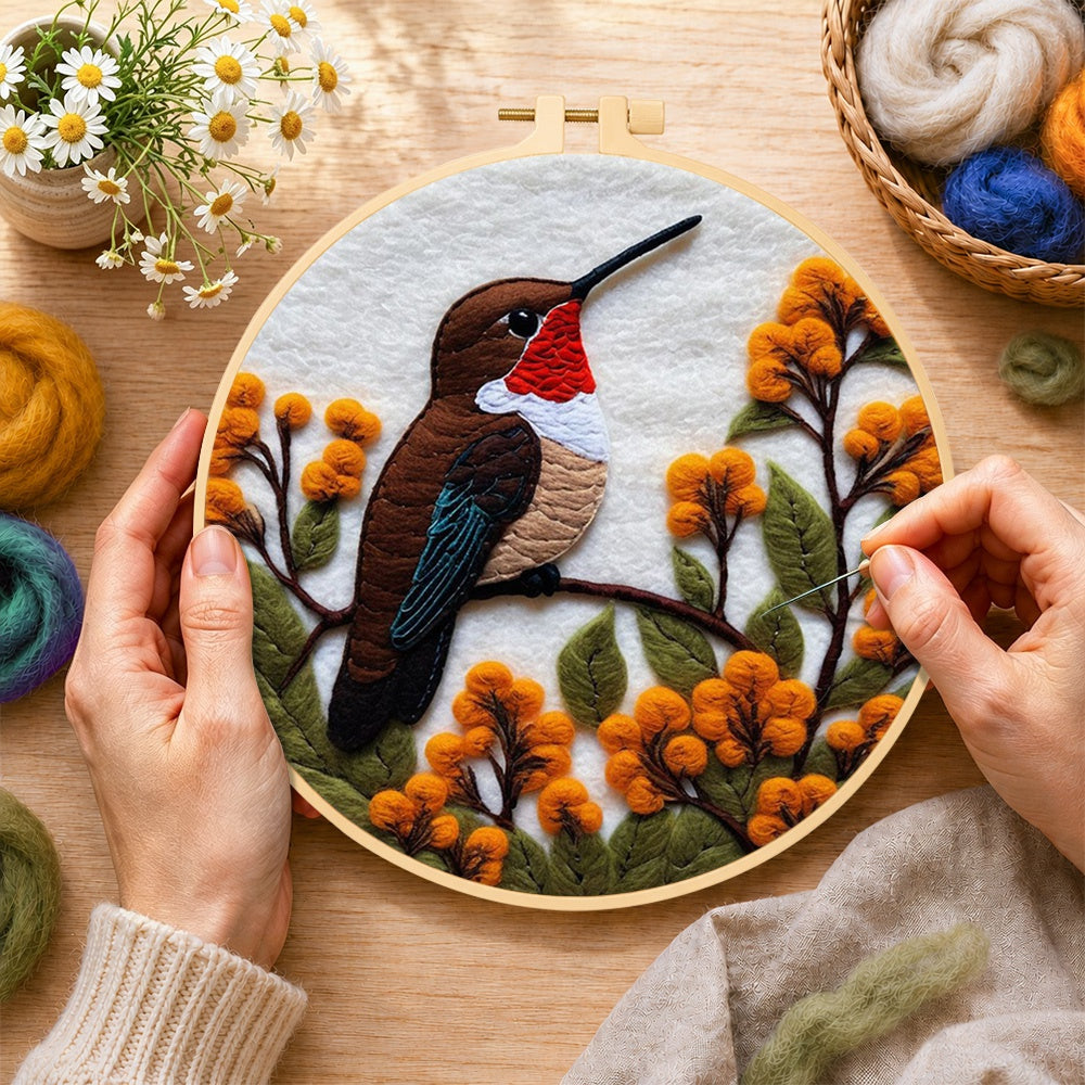 Creating the exquisite ruby-throated hummingbird and autumn flowers wool painting by hand with a felting needle