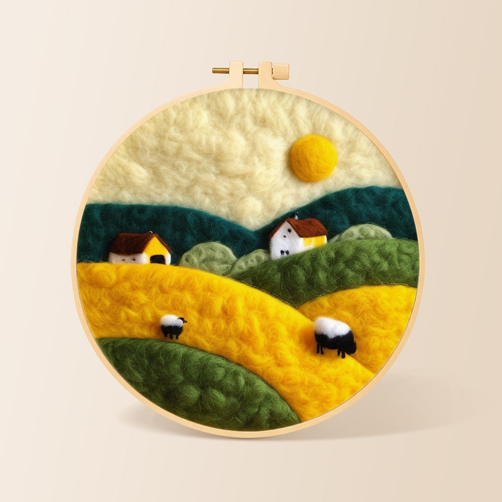 Farmhouses and rolling hills needle felting kit for beginners with a round wooden frame