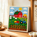 Farmyard animals and carrot field punch needle artwork displayed on a table