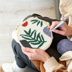 Creating handmade fern leaf punch needle artwork