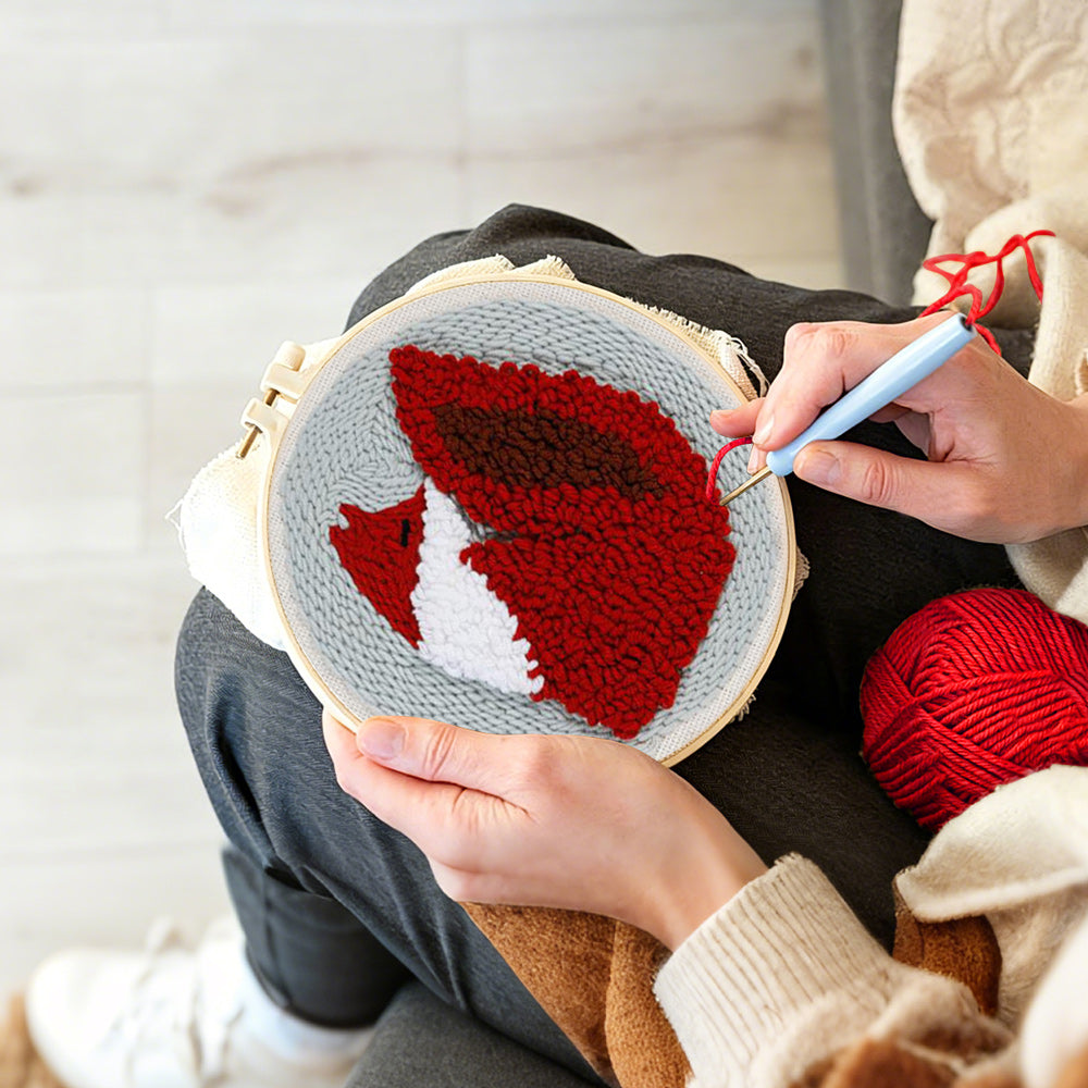 Creating handmade fiery red fox punch needle artwork