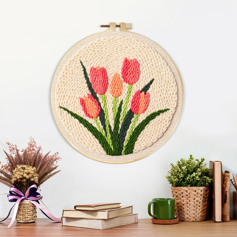Finished five coral tulips in bloom artwork displayed on a wall
