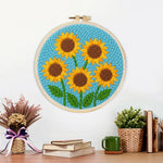 Finished five sunflowers artwork displayed on a wall