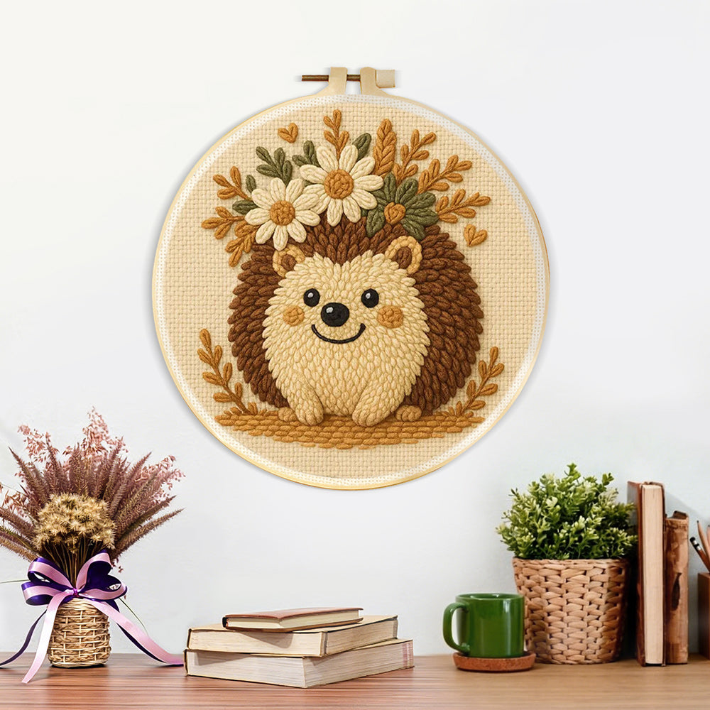 Finished floral crown hedgehog artwork displayed on a wall