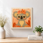 Finished floral crown koala artwork displayed on a wall
