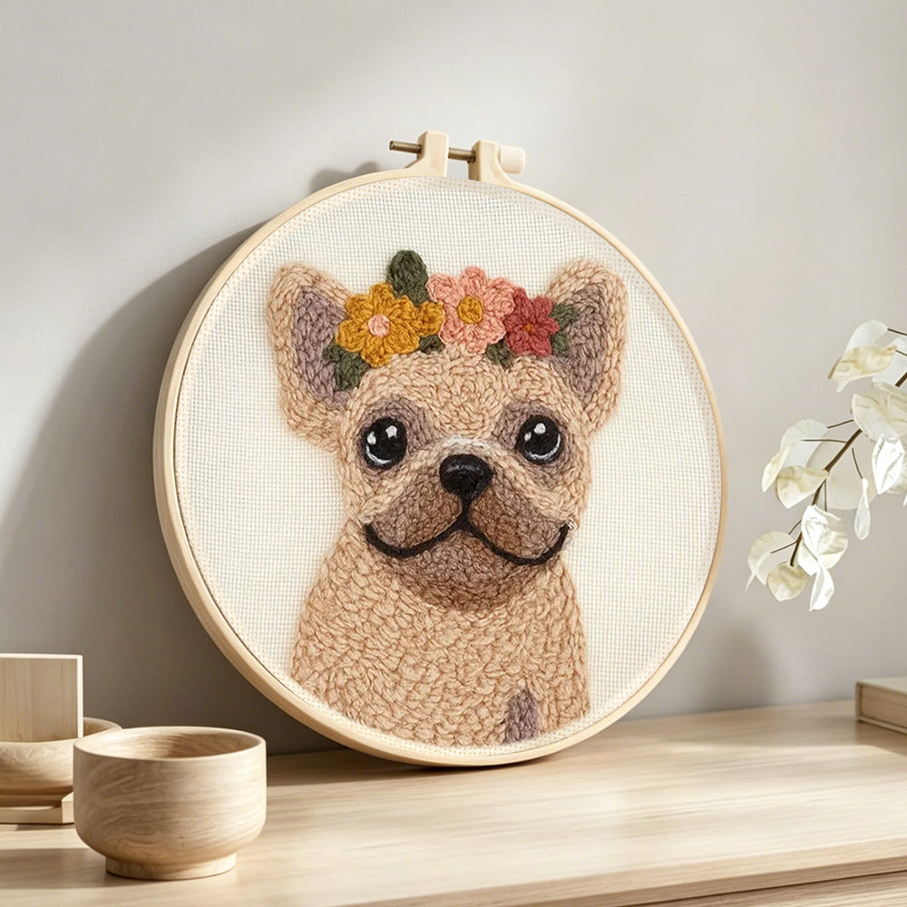 Floral french bulldog punch needle artwork displayed on a table