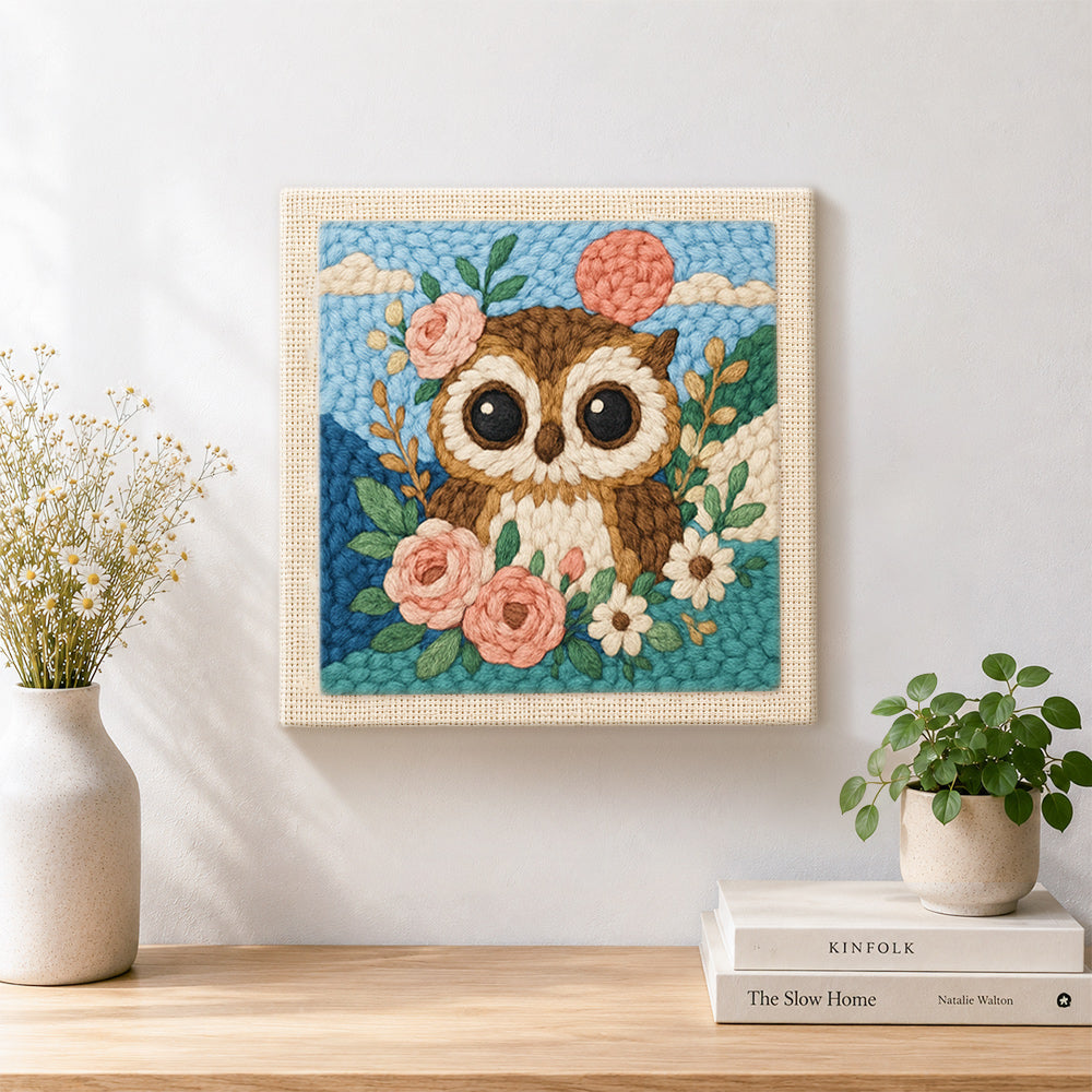 Finished floral owl with pink moon artwork displayed on a wall