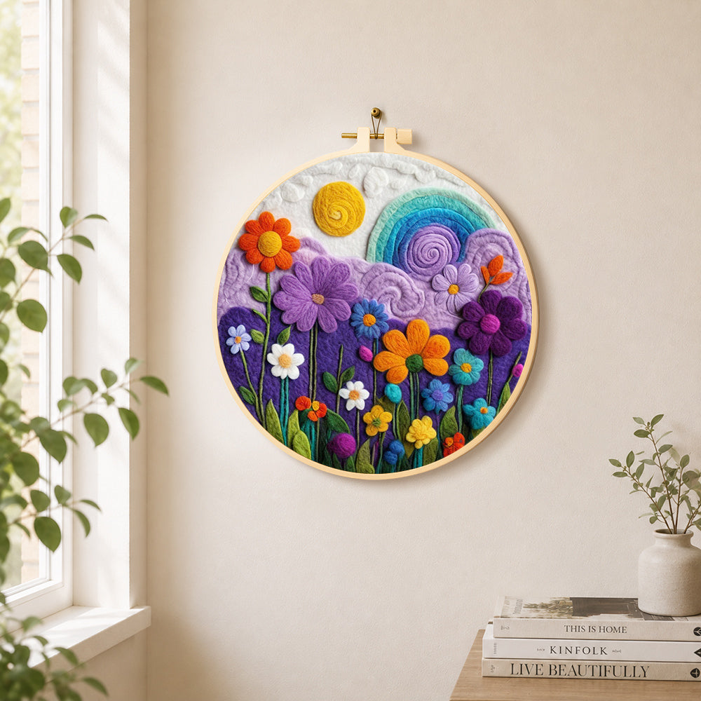 Flower field under the rainbow sky needle felt wall art displayed in a bright home interior