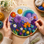 Creating the flower field under the rainbow sky wool painting by hand with a felting needle