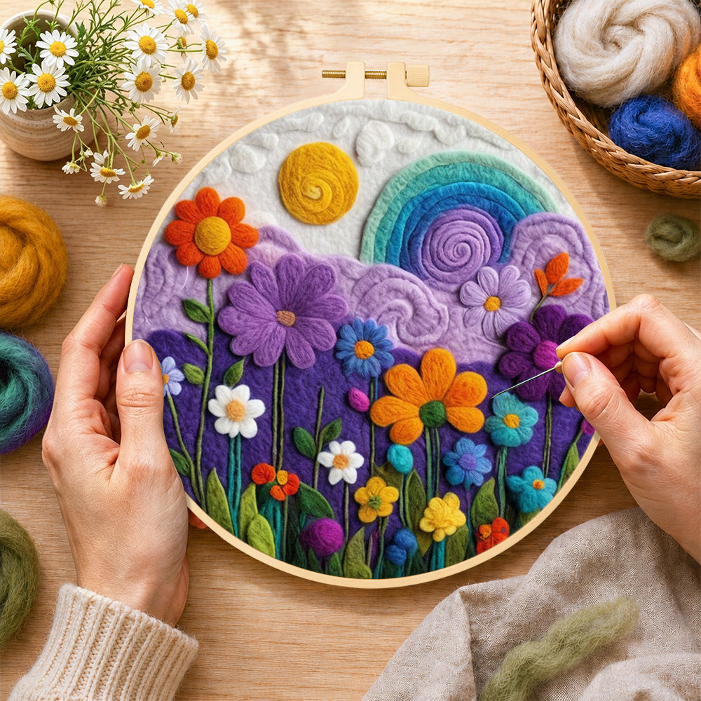 Creating the flower field under the rainbow sky wool painting by hand with a felting needle