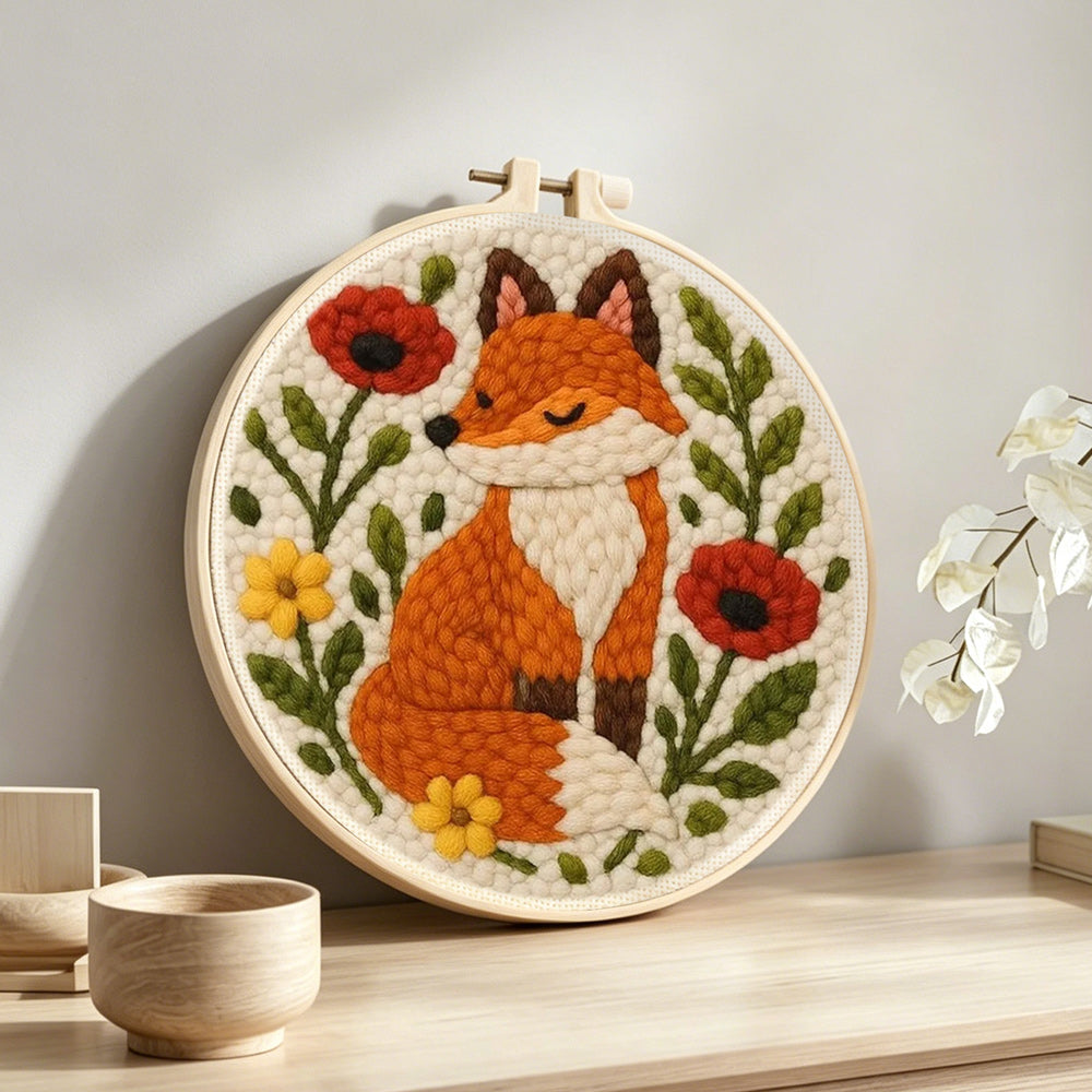 Flower fox punch needle artwork displayed on a table