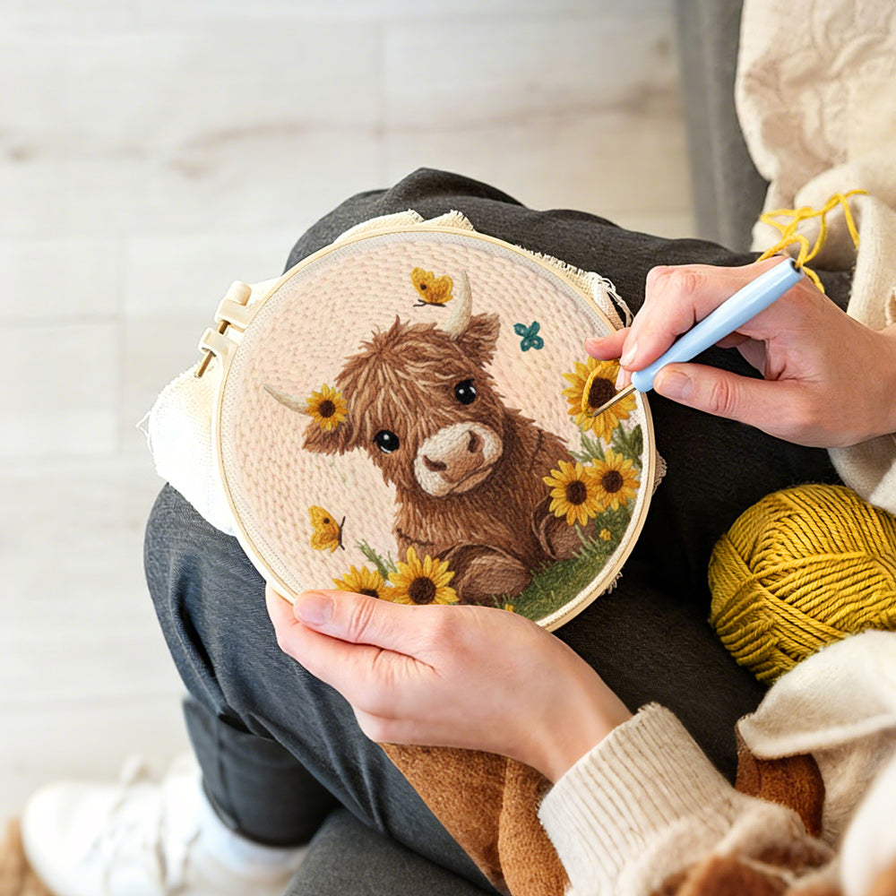 Creating handmade fluffy brown highland cow and sunflowers punch needle artwork