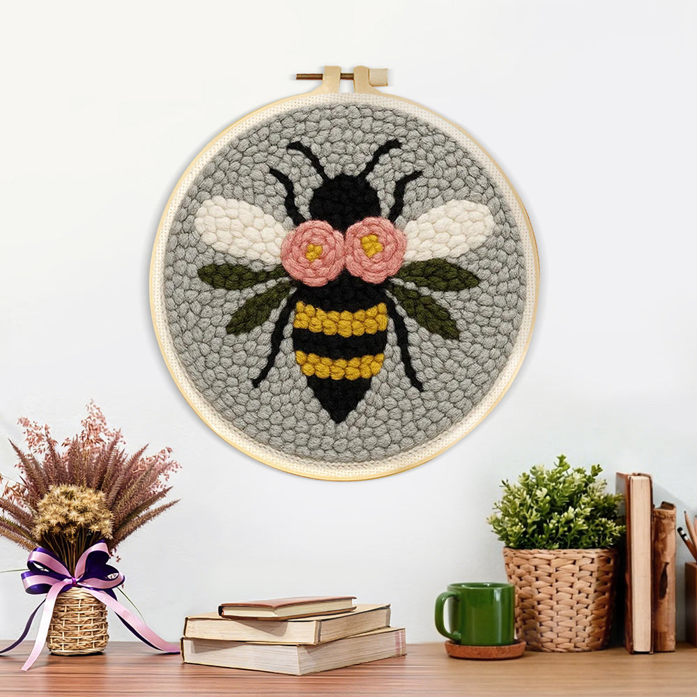 Finished flying bee artwork displayed on a wall
