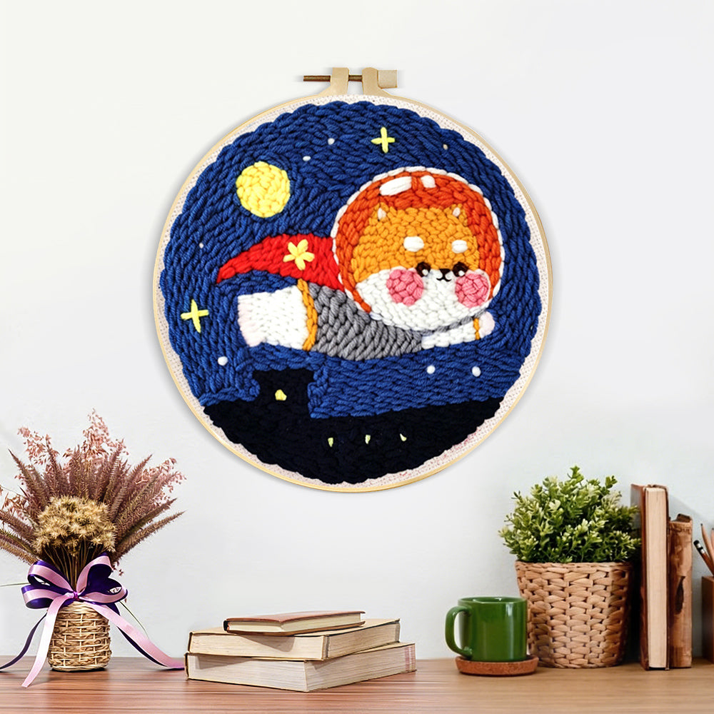 Finished flying space puppy artwork displayed on a wall