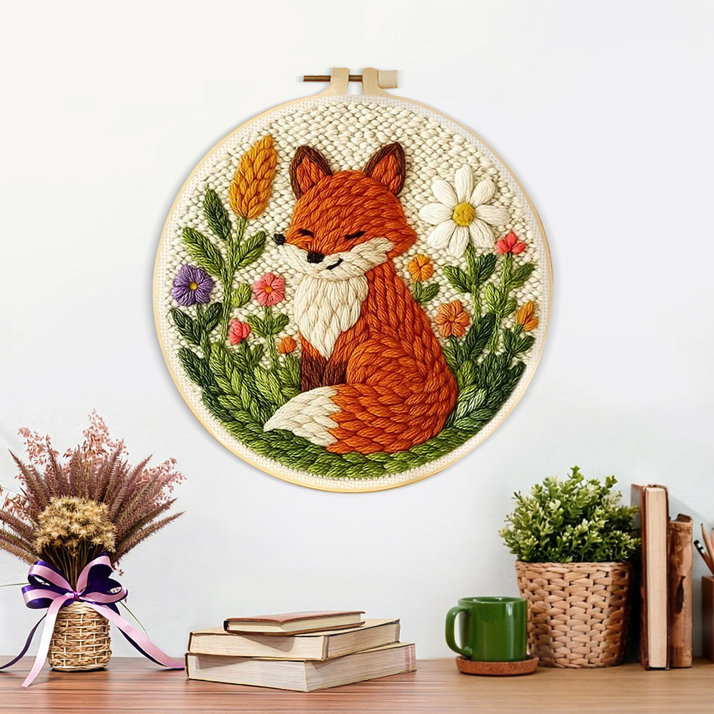 Finished fox in the flowers artwork displayed on a wall