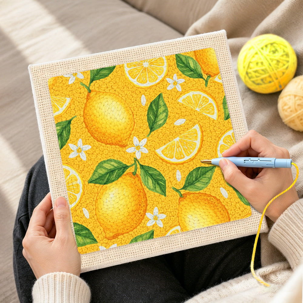 Creating handmade finished fresh lemons with leaves punch needle artwork