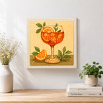 Finished fresh orange spritz with mint and ice cubes artwork displayed on a wall