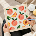 Creating handmade fresh peaches with leaves punch needle artwork