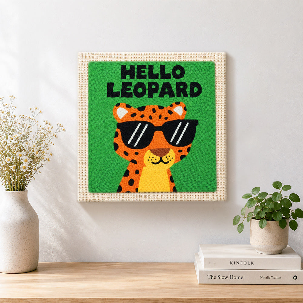 Finished funky "hello leopard" artwork displayed on a wall