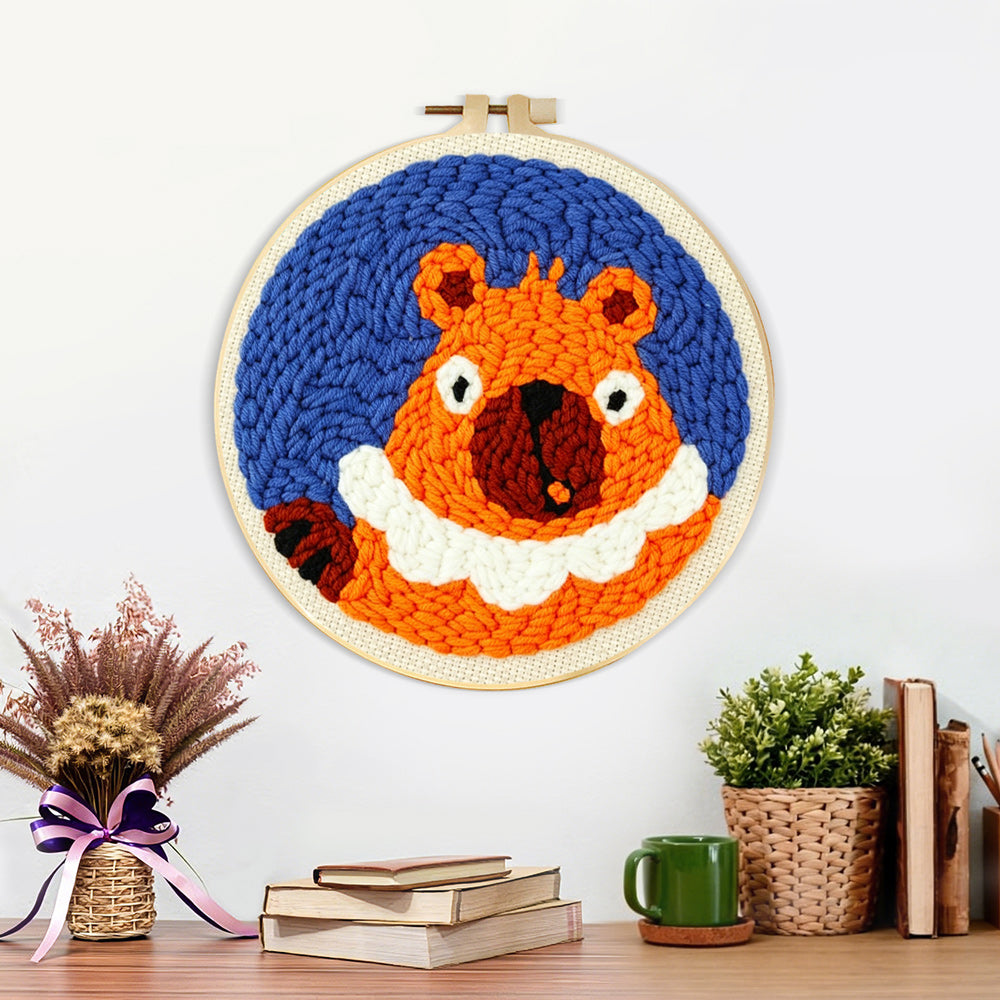 Finished funny orange squirrel artwork displayed on a wall